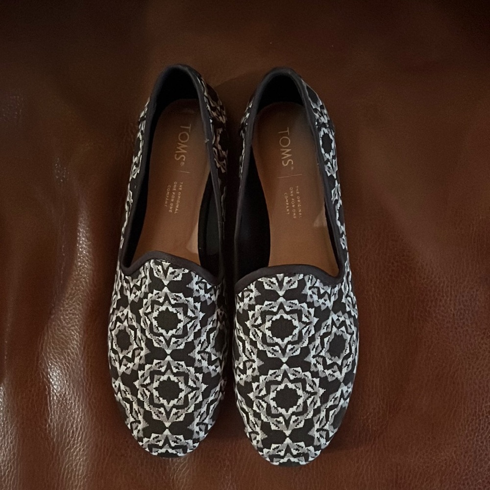 Size W8 Toms, never worn